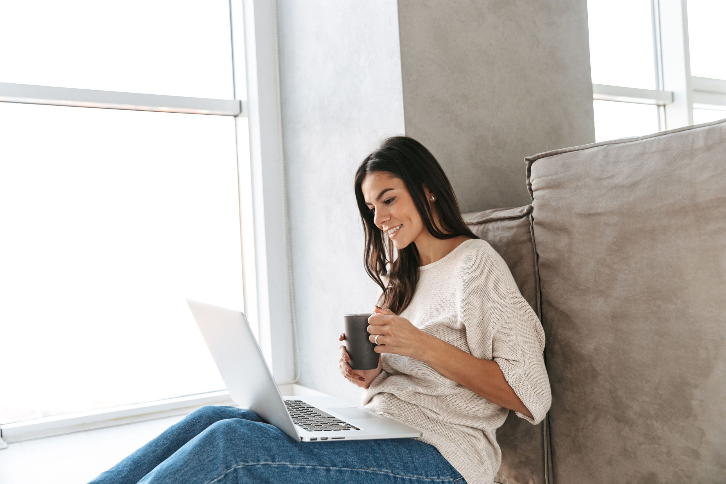 Woman learning Thought Field Therapy tapping method at home.